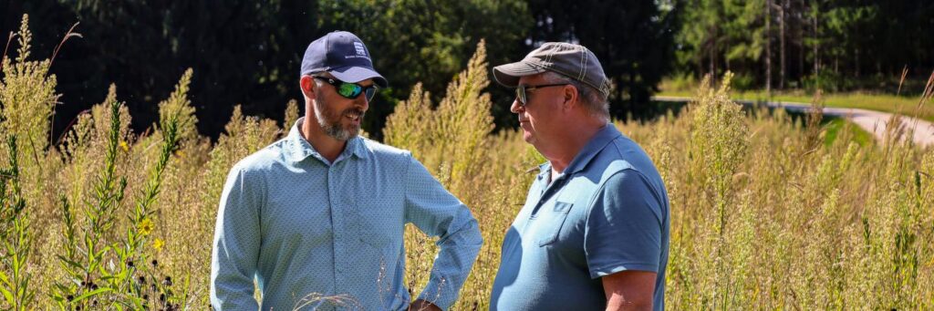 Landowner touring property with NRCS agent.